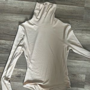 Cream turtleneck body suit
